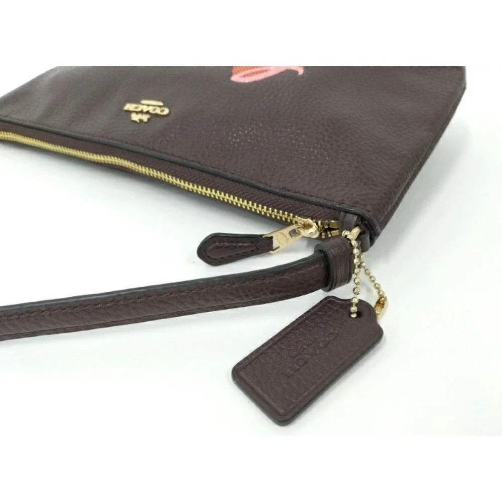 LARGE WRISTLET 25 WITH NEON COACH SCRIPT COACH NWT